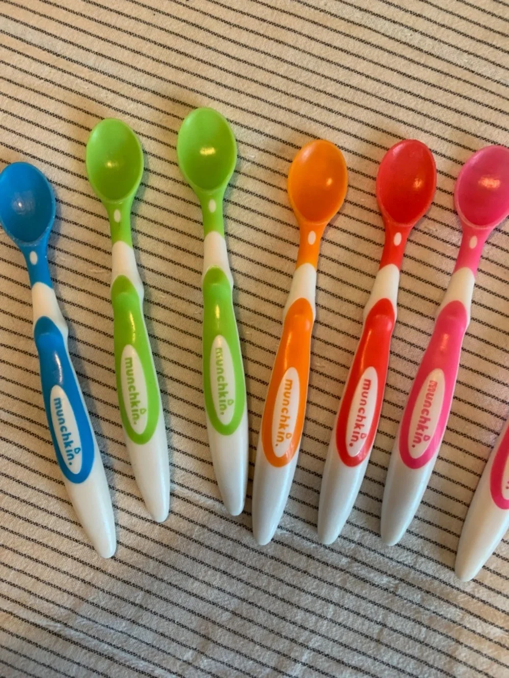 7 Munchkin Soft-Tip Infant Plastic Colored Spoons